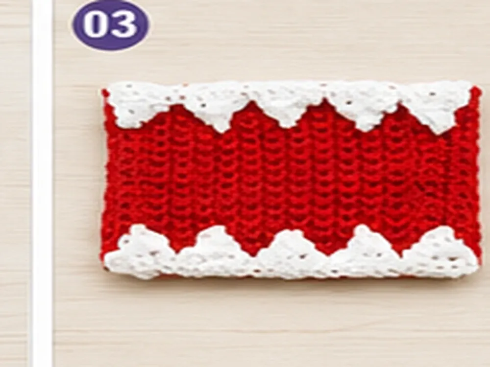 Red crochet monster mouth pocket with white teeth attached